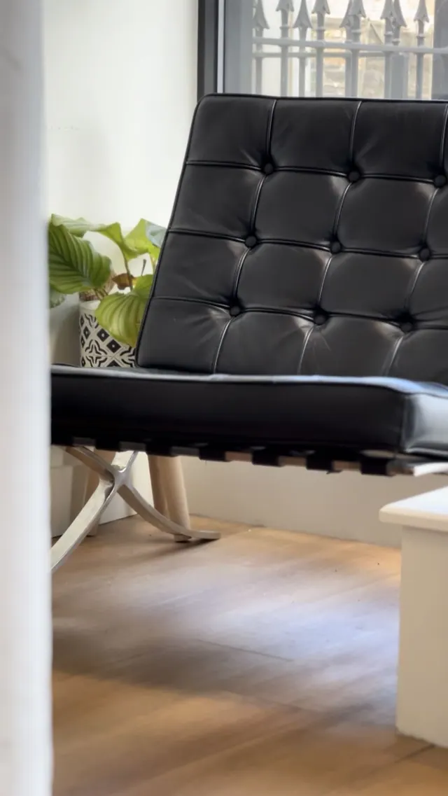 The waiting chairs at TINY's Barbershop